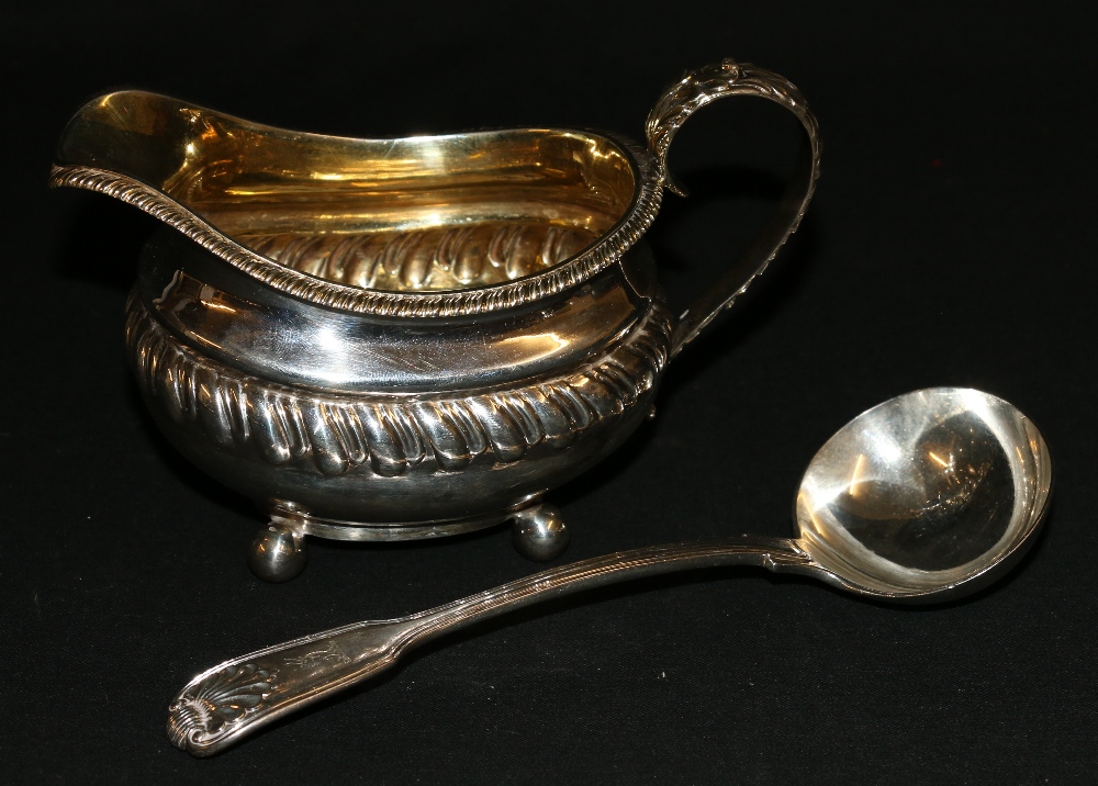 George IV silver cream jug raised on ball supports London 1823 JA approx 185g and a William IV