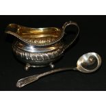 George IV silver cream jug raised on ball supports London 1823 JA approx 185g and a William IV