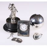 Silver presentation bowling jack, a wine label, an owl bookmark, a miniature easel clock, 6.