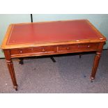 Victorian Edwards & Roberts mahogany writing table, with red leather skiver,