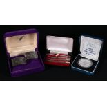 Cased set of four sterling silver whist pens,