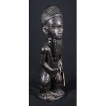 Ivory Coast, Baule standing male figure, with long beard and scarified chest and thighs,