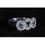 18ct white gold aquamarine and diamond cluster ring, size N, 4.