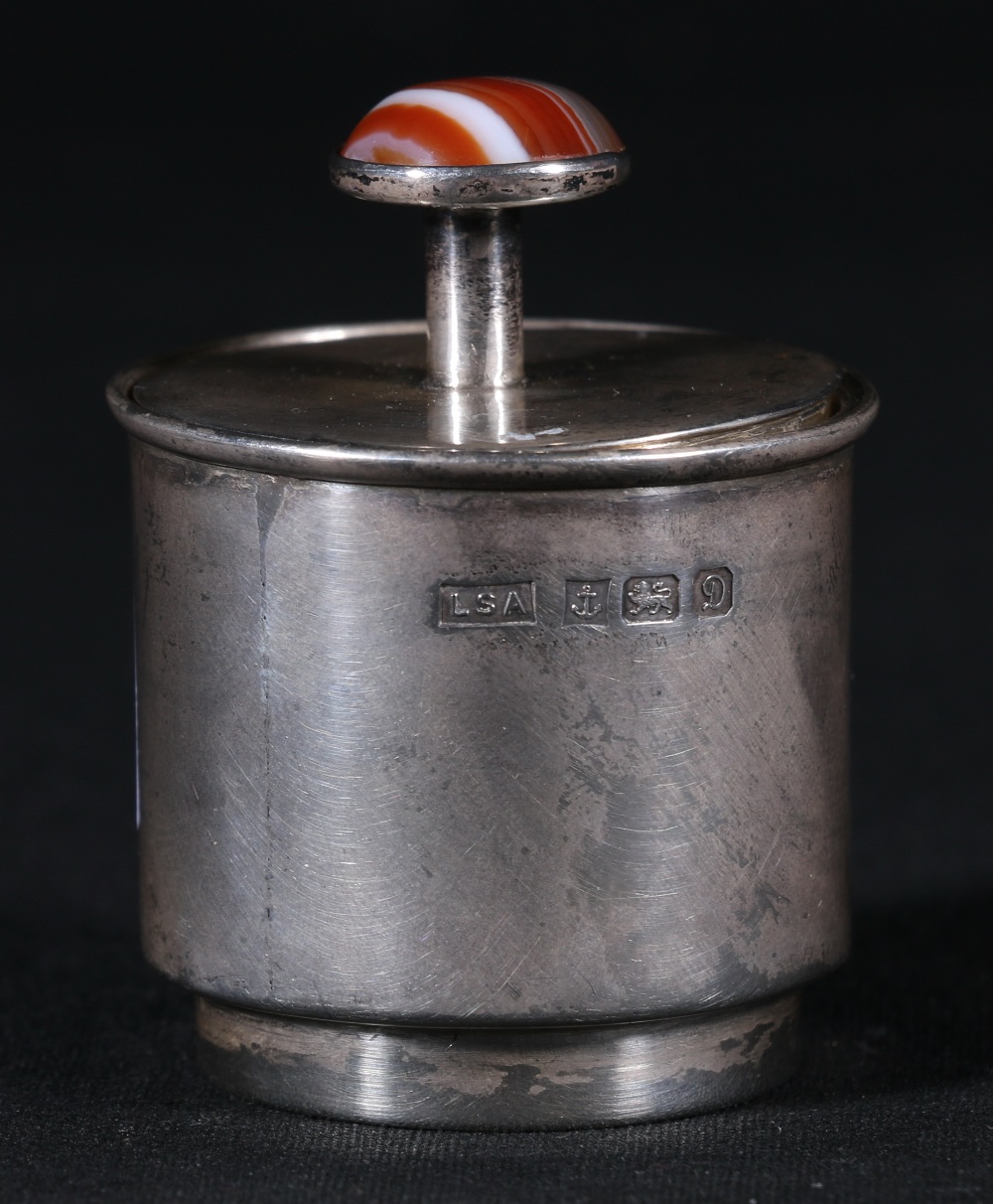 Silver trinket box of circular section with Scottish agate finial,