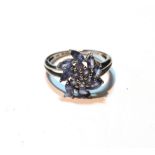 Tanzanite whorl cluster ring in platinum.