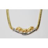 Egoli 9ct gold necklace with a group of elephants with diamond eyes upon a curb chain.