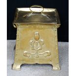 Arts & Crafts embossed brass coal bin of square form, 42cm high.