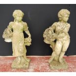 Pair of composition figures of a boy and girl holding baskets of produce, 75cm.