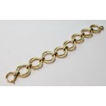 9ct gold bracelet of double entwined flat rings.