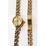 Lady's 9ct gold bracelet watch and the matching identity bracelet.