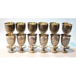 Set of six Iranian Isfahan silver wine goblets and six others, smaller, with waisted stems,