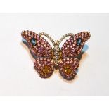 Gold butterfly brooch with various coloured sapphires and other gems, '9K'.