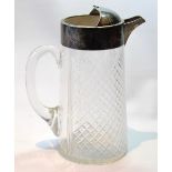 Cut glass iced water jug with silver rim, mount and spout, Birmingham 1912.