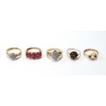 Three 9ct gold gem rings and two others.