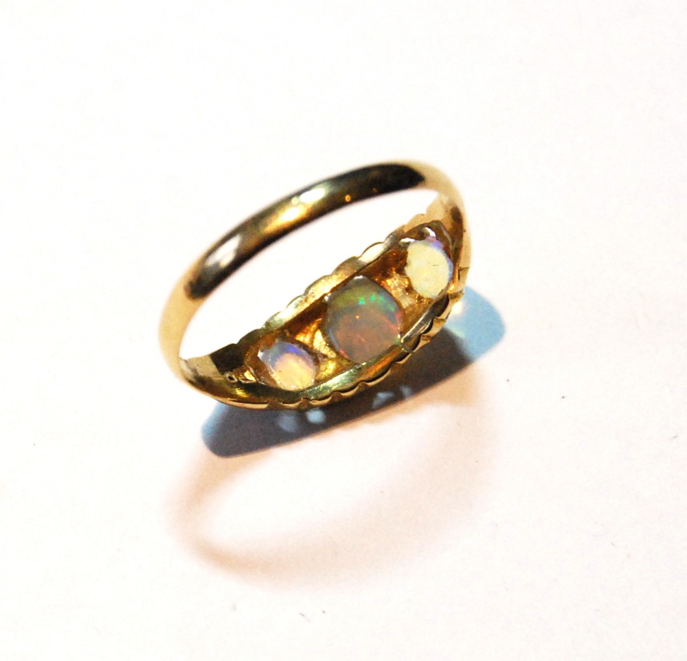 Opal three-stone ring with diamond points in 18ct gold, 1902. - Image 3 of 3