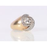 14ct gold diamond swirl ring, set with two round brilliants (both chipped), marked 14K.