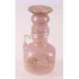 Roman style glass jug, the pinched square body with pink inclusions and spiral applied handle, 15cm.