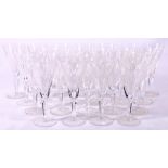 Waterford Crystal suite of twenty-two wine glasses, of tapered faceted form, etched marks, 18cm.