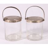 Pair of Edwardian Mappin & Webb silver mounted glass pickle jars, Birmingham 1915, 13cm.