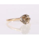 Diamond solitaire ring, with old cut brilliant of pale brown colour., approx. 1 carat.