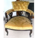 Edwardian mahogany framed drawing room tub chair, upholstered in gold coloured fabric.