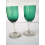 Pair of green Victorian wine glasses.