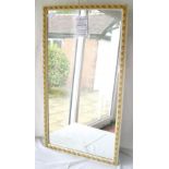 Gilt framed wall mirror.