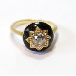 Ring with Victorian old-cut diamond and enamel boss.