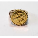 Half sovereign, 1925, in soldered 9ct gold ring mount.