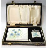 Silver cigarette case with enamelled spray of cornflowers, and the matching lighter, cased.