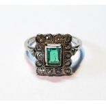 Art Deco rectangular cluster ring with a pale emerald and old-cut diamond brilliants.