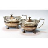 Pair of silver mustard pots of Regency style, rectangular upon scalloped feet, Nathan & Hayes,