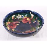 Moorcroft blue ground floral decorated bowl.