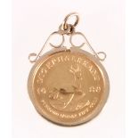 1980 1/10th Krugerrand gold coin, set in a pendant, 42g gross.