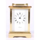 Angelus lacquered brass carriage clock, with presentation plaque, striking on a bell, 17cm.