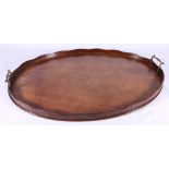 Oval mahogany twin handled tray, 70cm.