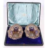 Cased pair of Walker & Hall silver pierced oval bonbon dishes, Sheffield 1902, 1356g gross, 14.5cm.