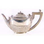 Victorian silver batchelors teapot, of demi-fluted oval form, London 1894, 248g gross.