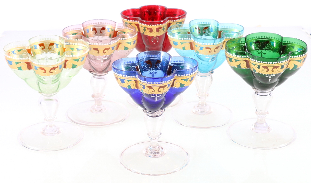 Suite of six handmade Venetian coloured and enamelled sundae glasses with lobed bowl,