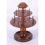 Victorian mahogany three-tier bobbin stand, with pin cushion terminal.