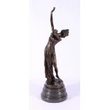 Modern bronze figure of a scantily clad dancer on a circular marble base, 56cm.