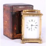 French brass carriage timepiece with enamel Roman dial, compensated platform escapement,