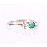 18ct gold and platinum diamond and emerald three stone ring, marked '18ct plat'.