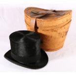 Tan leather cased Gents black silk top hat, makers Forsyth of Edinburgh.