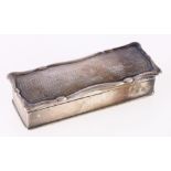 Edwardian serpentine rectangular silver snuff box with engine turned decoration, Birmingham 1905,