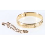9ct yellow gold flat link bracelet, 6.45g and a rolled gold engraved bangle.