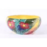 Wemyss hand painted bowl decorated with flowers, yellow interior, painted mark to base numbered 218,