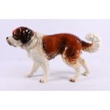 A Goebel porcelain figure of a St Bernard, 27cm high.