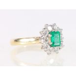 18ct yellow gold diamond and emerald ring, the emerald approximately 5.5mm x 4mm, ring size N, 6.