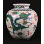 Large 19th century Chinese famille verte jar, decorated with two confronting dragons,